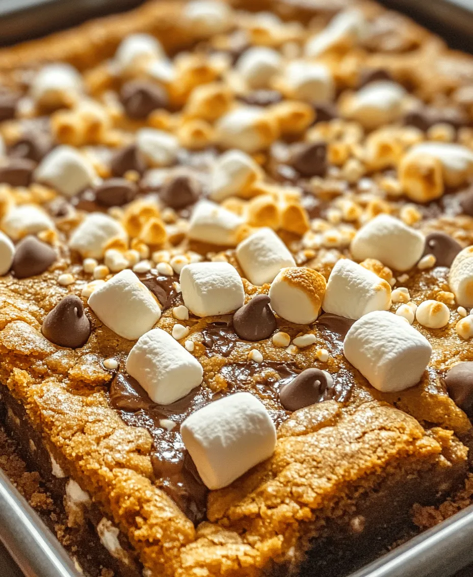 S'mores have long held a cherished place in the hearts of many, often evoking fond memories of summer nights spent around crackling campfires. The classic combination of toasted marshmallows, gooey chocolate, and crunchy graham crackers creates an irresistible treat that transcends generations. However, not everyone has access to a campfire, and sometimes, the craving for s'mores strikes at the most inconvenient times. Enter S'mores Cookie Bars—a delectable and convenient way to experience all the flavors of traditional s'mores without the need for outdoor adventures. These cookie bars bring the nostalgia of s'mores to your kitchen, making them perfect for gatherings, dessert tables, or simply as an indulgent family snack.