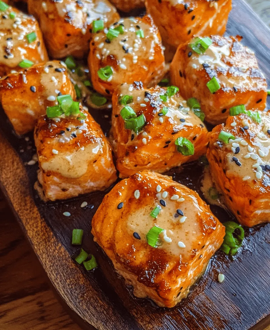 Bang Bang Salmon Bites are a culinary sensation that has taken the food world by storm. This dish marries the rich, buttery flavors of fresh salmon with a spicy, creamy sauce that elevates it to a new level of deliciousness. Perfect for both casual dining and special occasions, these bite-sized morsels are not only visually appealing but also incredibly satisfying. The crispy exterior and tender interior create a delightful contrast, making this dish an instant favorite among seafood lovers and spice enthusiasts alike.